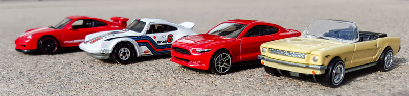 Porsche 911 GT3 RS, Porsche 911 Carrera RS, 2015 Ford Mustang GT, and 1965 Ford Mustang. Photo credit MustangFan